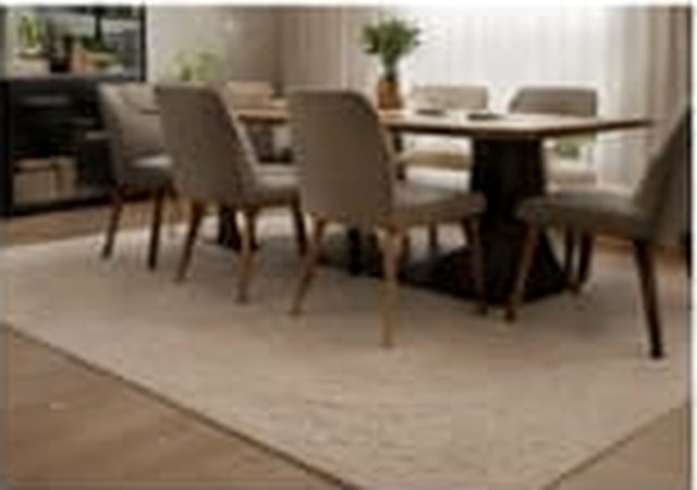 Neutral carpet under a dining table